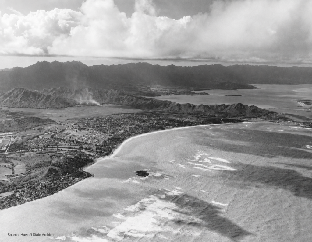 Historic aerial photograph of Kailua, Oahu, showing Kailua Bay, the growing town, surrounding ridgelines, and Windward Oahu coastline.