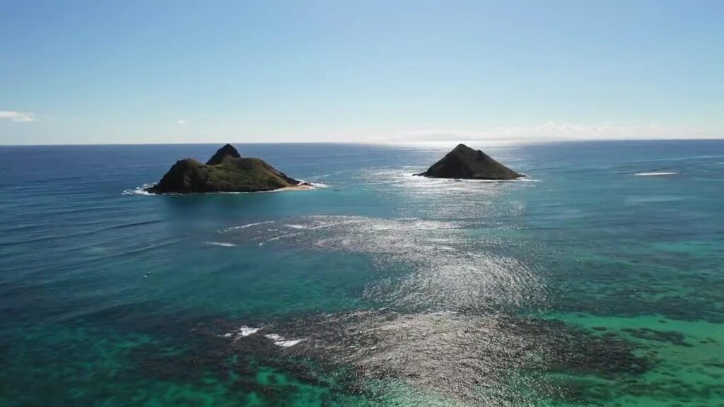 Moku Nui and Moku Iki in the Mokulua Islands, viewed across the water off Lanikai Beach