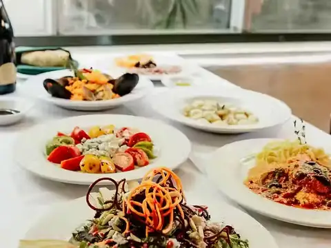 Italian dishes on a white tablecloth at Baci Bistro in Kailua, Oʻahu