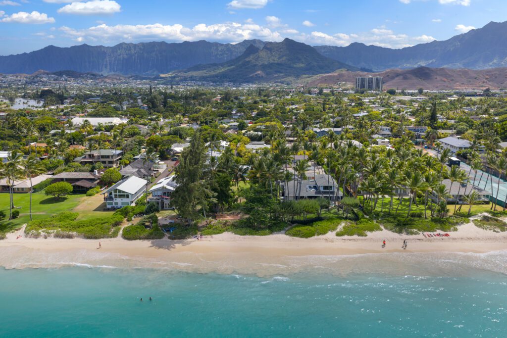 Aerial view of the beachfront estate and Kailua Beach with the Koʻolau Mountains behind at Kailuana Beachfront Estate