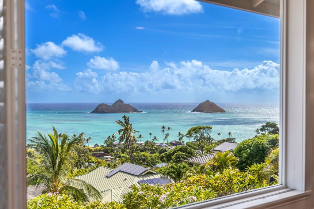 Mokulua Islands seen from the primary suite window at Koohoo Place
