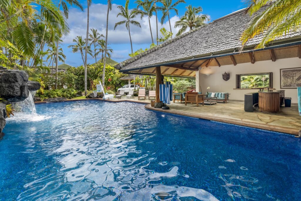 Lagoon-style saltwater pool beside the pool pavilion at Paul Mitchell Estate