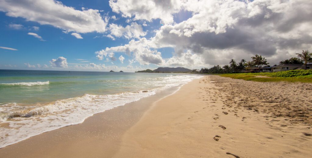 Wide sandy stretch of Kailua Beach in front of the house at Pueohala