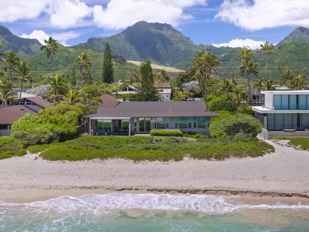 Aerial view of the beach house on Kailua Beach with the Koʻolau Mountains behind at Pueohala